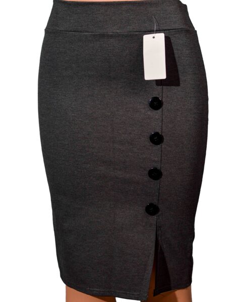 Pencil Skirt Stretchy, heavy nylon fabric. Left leg slit. Has black  buttons aligned.